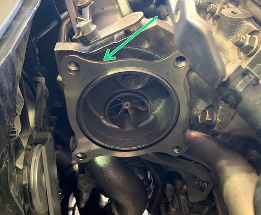 Clean and place OE gasket as shown