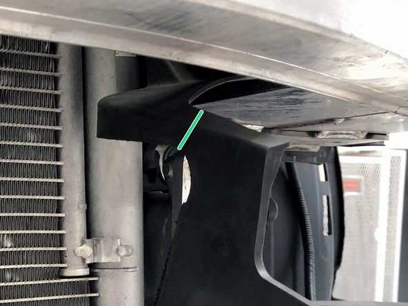 Locate the area in yellow on the driver's side shroud