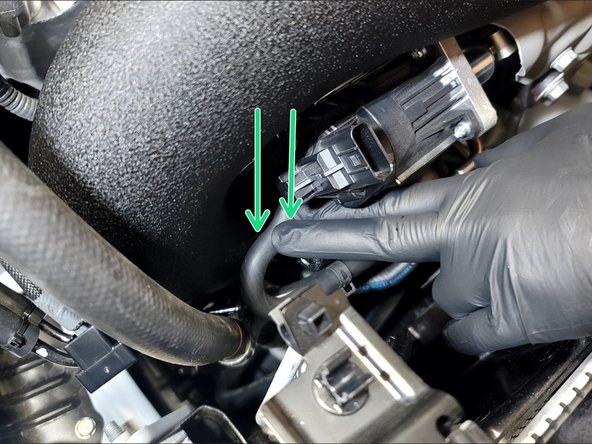 Place provided turbo flange gasket onto turbo as shown