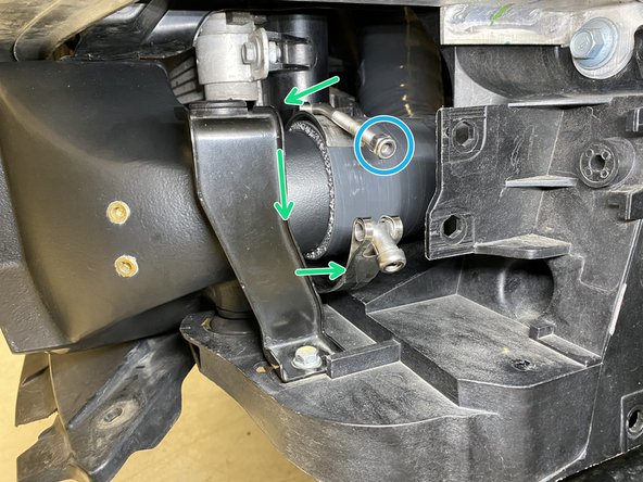 Locate a 67-75mm T-Bolt clamp and remove the nut from the threaded rod