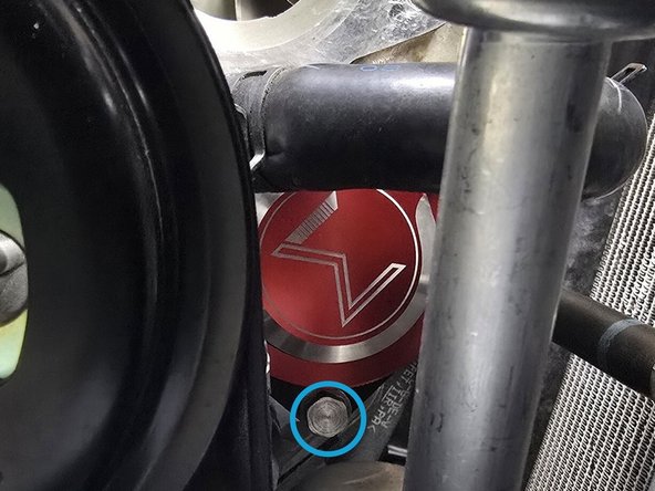 You may need to rotate the coolant line spring clamp circled in purple to provide more clearance