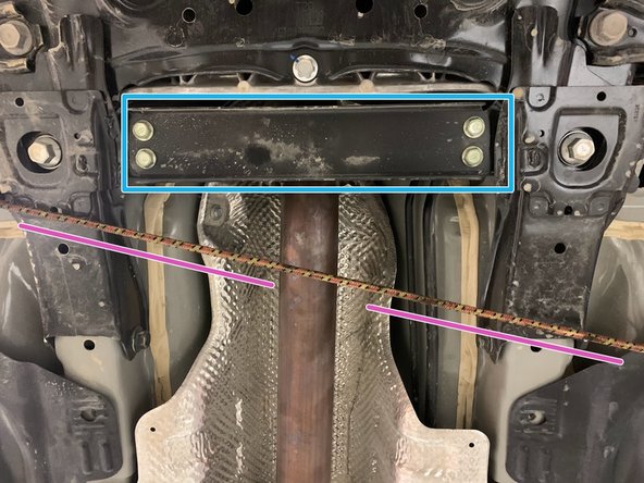 Remove (4) 14mm bolts shown for easier access to flanges