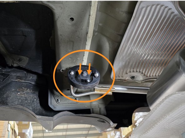 Using the same location as before, support the back of your 27WON exhaust with a friend or jack