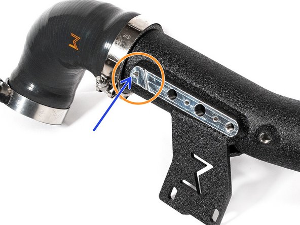 There is a machined slot on the cold pipe to keep hose bracket in position