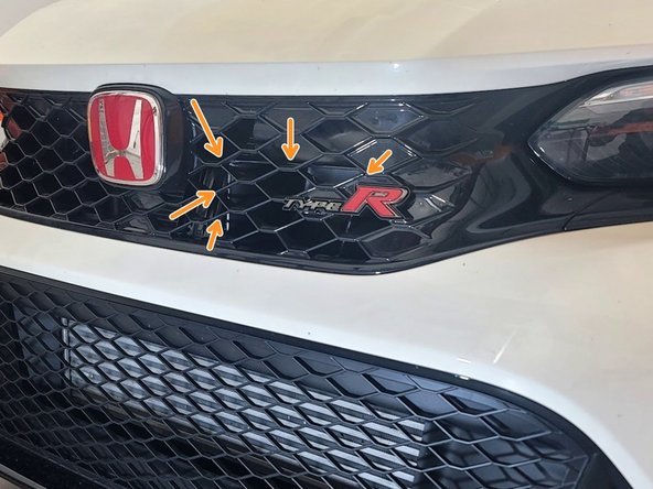 Snorkel can be touching the grille but should not be deforming it. If it seems like there is a lot of pressure on the grille then revisit Step 24 and 25 and make sure the Snorkel sits as close to the intake as possible