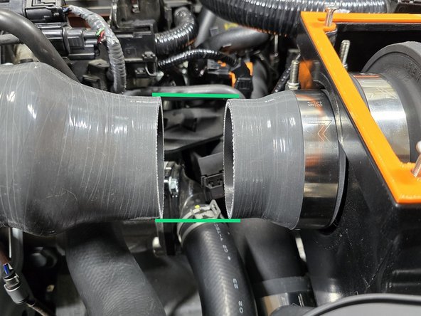 Verify the airbox mounting holes can be aligned as shown