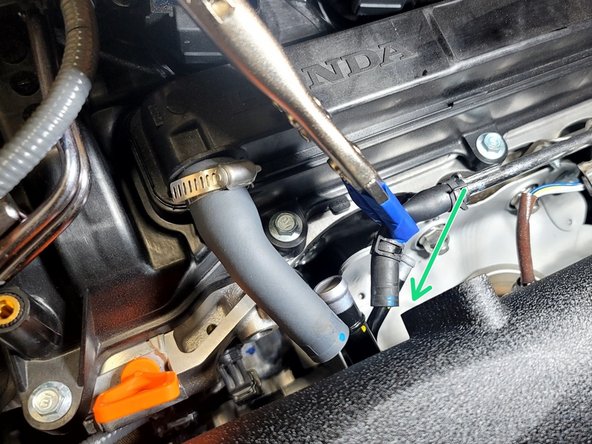 Connect upper rubber coolant feed line to hardline