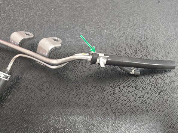 Replace hose with the provided short piece of 5.5mm ID silicone hose