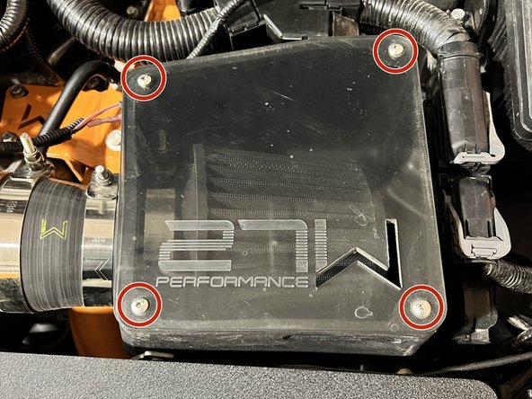 Using the 3mm Allen tool remove the 4x screws securing the lid to the airbox