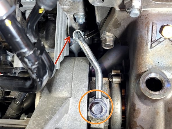 Verify that the oil feed braided hose is not touching or rubbing any components