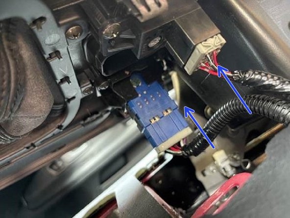 Plug the (2) pigtail clips on to the center console cover