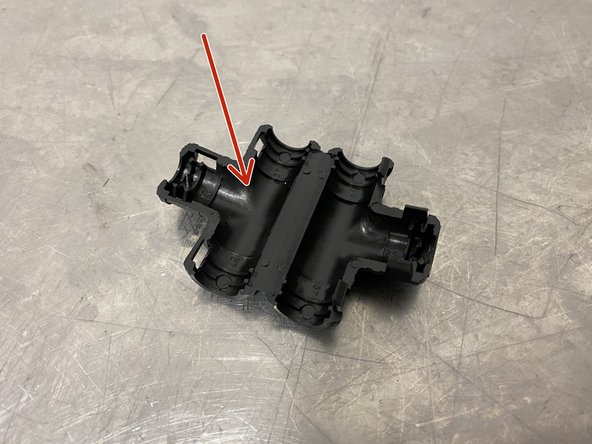 Locate the provided wiring loom T-cover