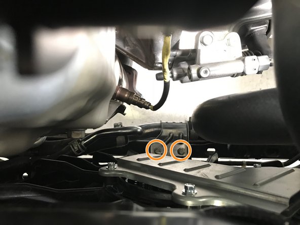 Use a 10mm socket &amp; torque wrench to install the two (2) 10mm bolts holding the lower radiator hose in place.  Torque to 8-10 ft-lbs