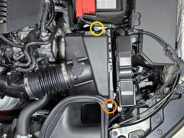 Use a 3/8" ratchet, a long extension, and a 10mm socket to remove lower intake bolt