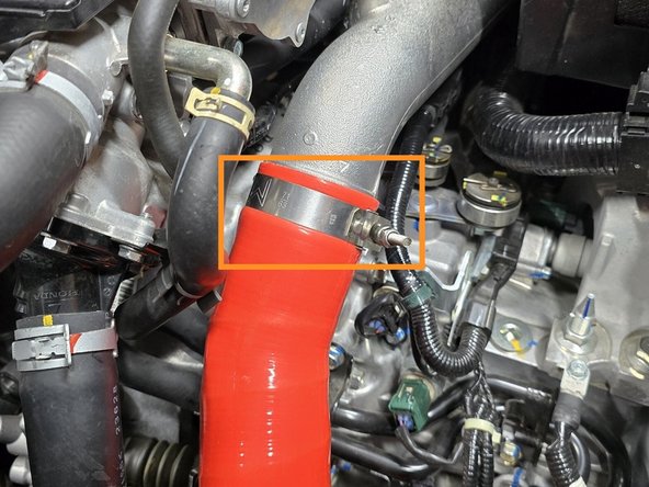 Correctly position the 63-71mm clamp over the cold pipe and tighten with a 10mm socket and 3/8" drive ratchet until the silicone starts to bulge slightly at the edge of the clamp