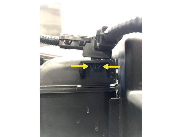 Use needle noise pliers to pinch the clips then pull the cover off the airbox