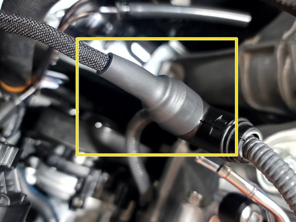 Use heat gun to heat shrink tube. Part of the heat shrink tube should cover the Wiring Loom T-Cover as shown