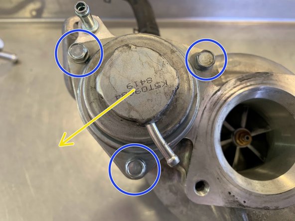 Remove the (3) 10mm bolts for the bypass valve
