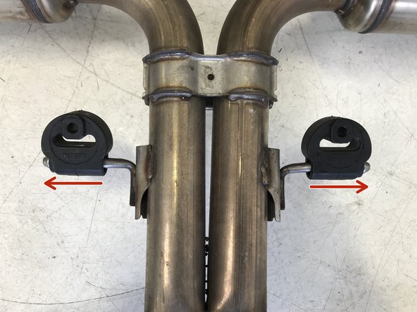 Remove the rubber hanger from the OE Muffler Section