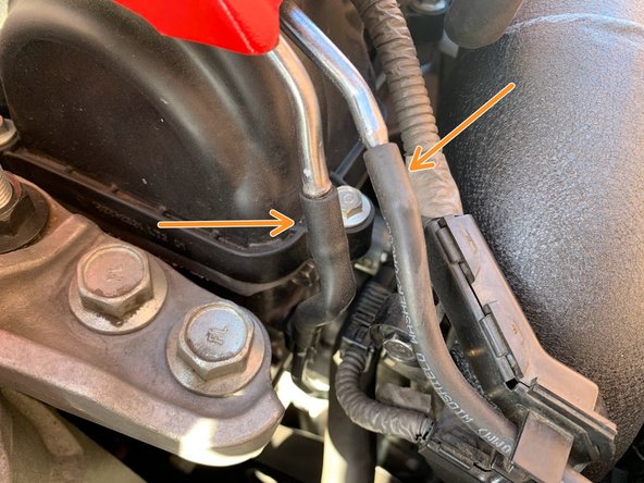 Reinstall the 10mm bolt to the lower hardline mounting bracket.  Torque to  9.8 ft-lb