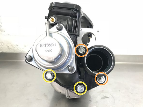 Locate the provided two (2) M8x80mm flange bolts