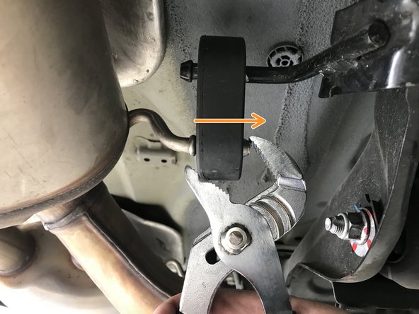 Pull the single rod hanger completely off the hanger rod and pivot out of the way as shown