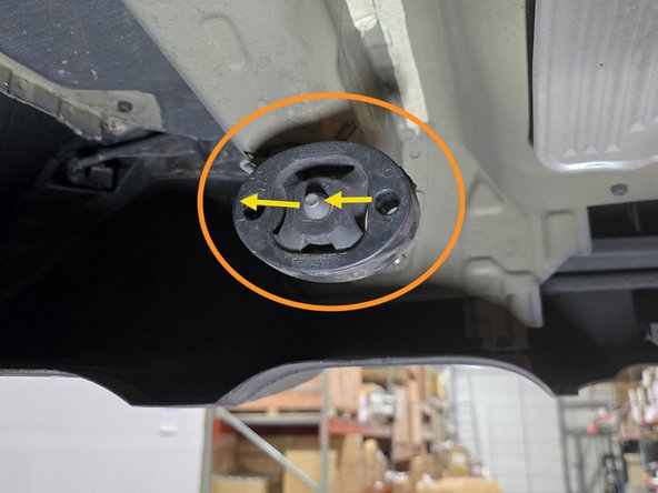 Using a spray cleaner, lubricate the hanger