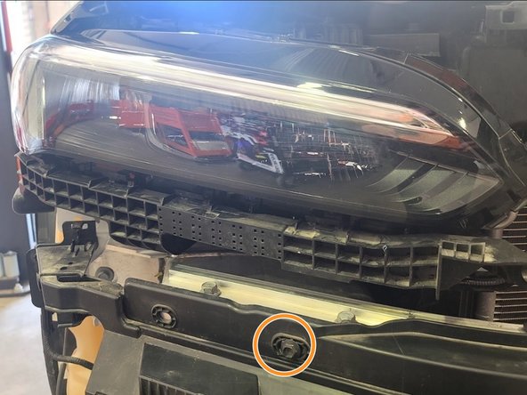 Remove two (2) bolts using a 10mm socket and ratchet