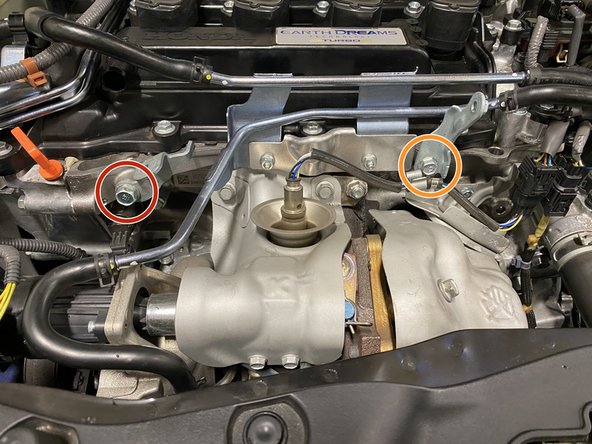 Use a 14mm socket &amp; ratchet to remove the one (1) 14mm bolt and bracket