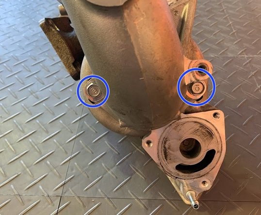 Turbo inlet pipe assembly is shown off the car here because the bolts are hard to see installed on vehicle