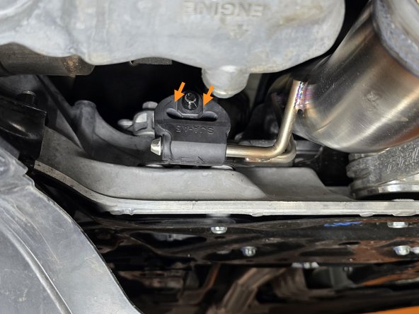 Guide the 27WON front pipe into the car