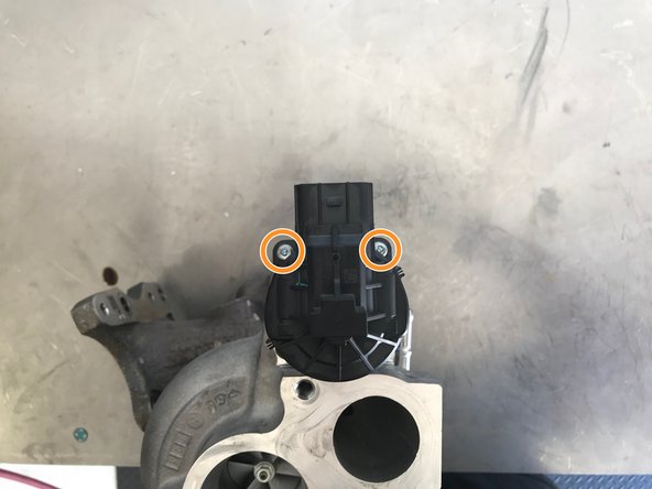 Use a 3mm Allen to remove the four (4) socket caps screws holding the WGA