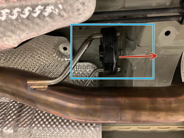 Using a spray cleaner, lubricate the rubber hanger