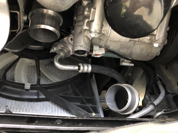 Slide this clamp toward the center of the OEM boost tube and out of the way