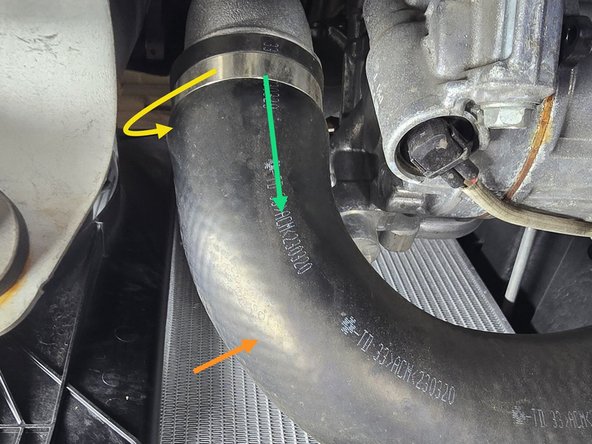 Slide the clamp toward the center of the OEM hot side boost tube and out of the way