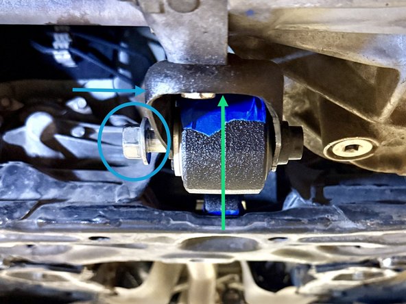 Rotate the RMM up and into the engine mounting bracket - the partially installed bolt will align with the slot in the engine side mounting bracket