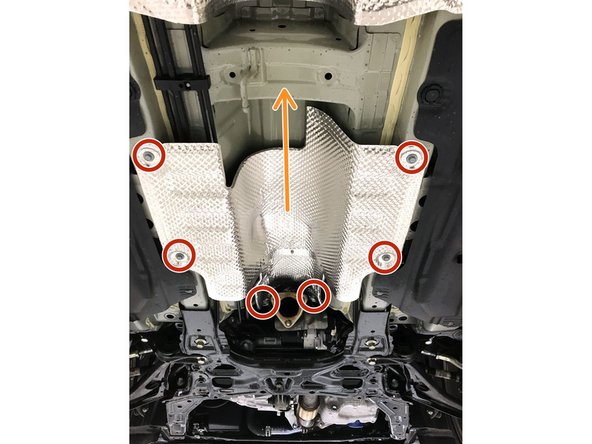 Front-pipe back exhaust has been removed for clarity of image, but doe snot need to be removed to relocate the heat shield out of the way