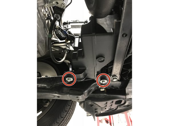 From under the vehicle locate the two bolts, use a 10mm socket &amp; ratchet to remove the two bolts