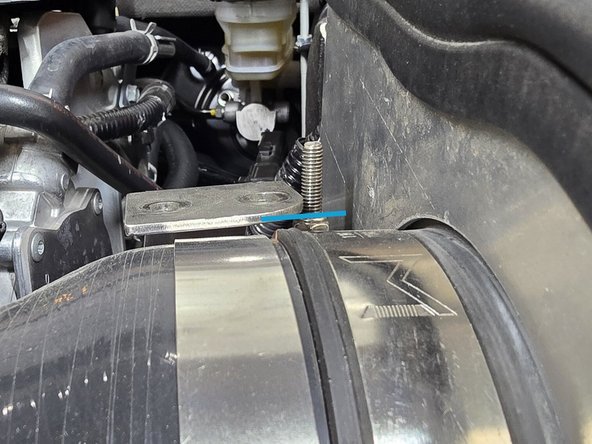 Rotate the silicone on the MAF housing until the filer is sitting close to the center of the shroud hole