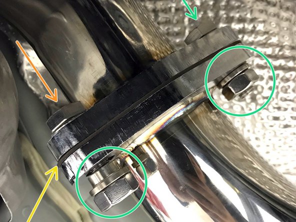 Install the provide tri-bolt metal gasket