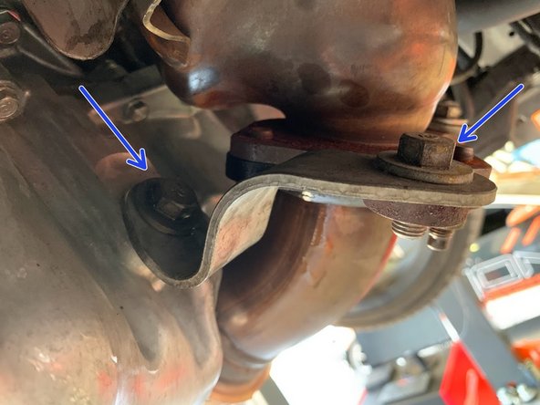 Align the left side bracket and reinstall the (2) OE 14mm bolts with anti-seize. Torque to 30-40 ft-lbs