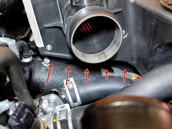 Verify at least 10mm or 1/3&quot; of  clearance between FMIC Outlet piping and intake as shown