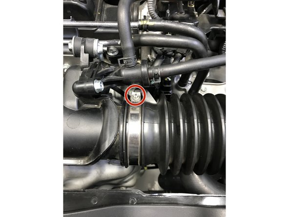 Use a 5.5mm socket to loosen the hose clamp