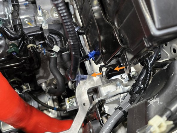 The underside of the bottom clip can be a PITA to reach, using a tool with a hook, like a 45 degree pick, can make this much easier