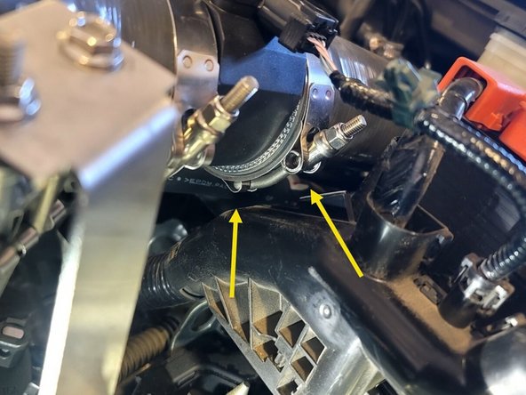 Make sure clearance between loom. If necessary rotate the throttle body silicone up at the throttle body