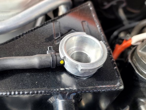 Use a Zip-tie to secure the hose to the barb and prevent leaks