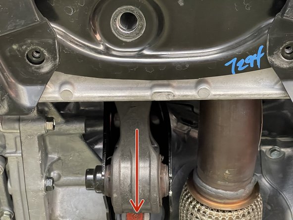 Pull the motor mount down a little bit and slide the OE Motor Mount toward the front to take it out