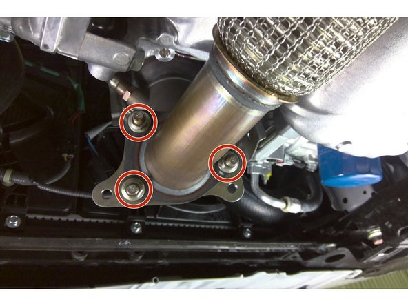 Using a 15mm socket and 3/4&quot; drive ratchet, install the three (3) provided nuts. Torque to 40 ft-lbs. at outlet flange 