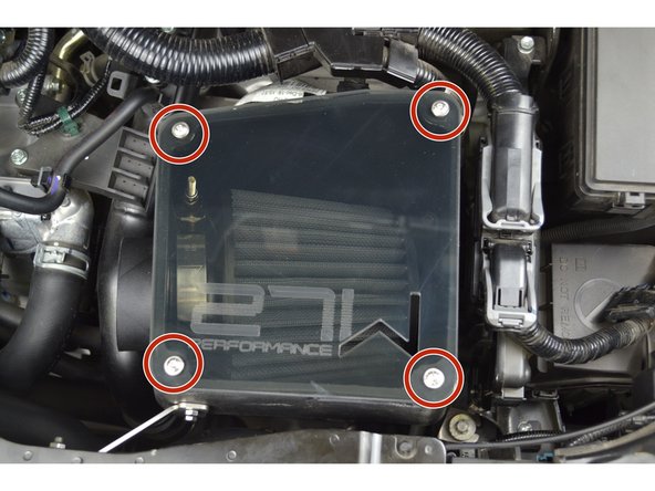 Place the airbox lid onto the airbox