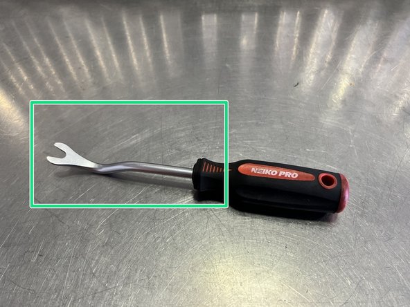 Use a #2 Philips head screwdriver to remove  the six (6) Philips pan head screws shown in red circles
